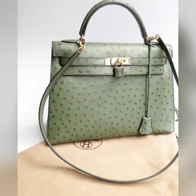 Sac à main vert avec cadenas, style peau grainée