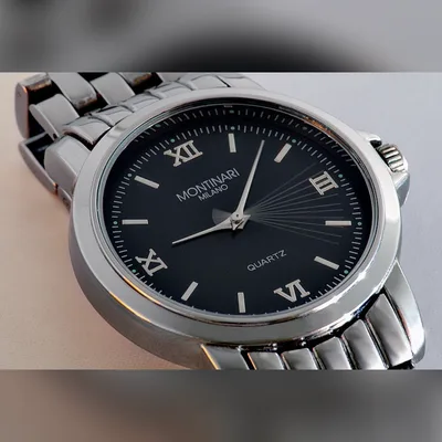 Montre homme cadran noir bracelet métal argenté
